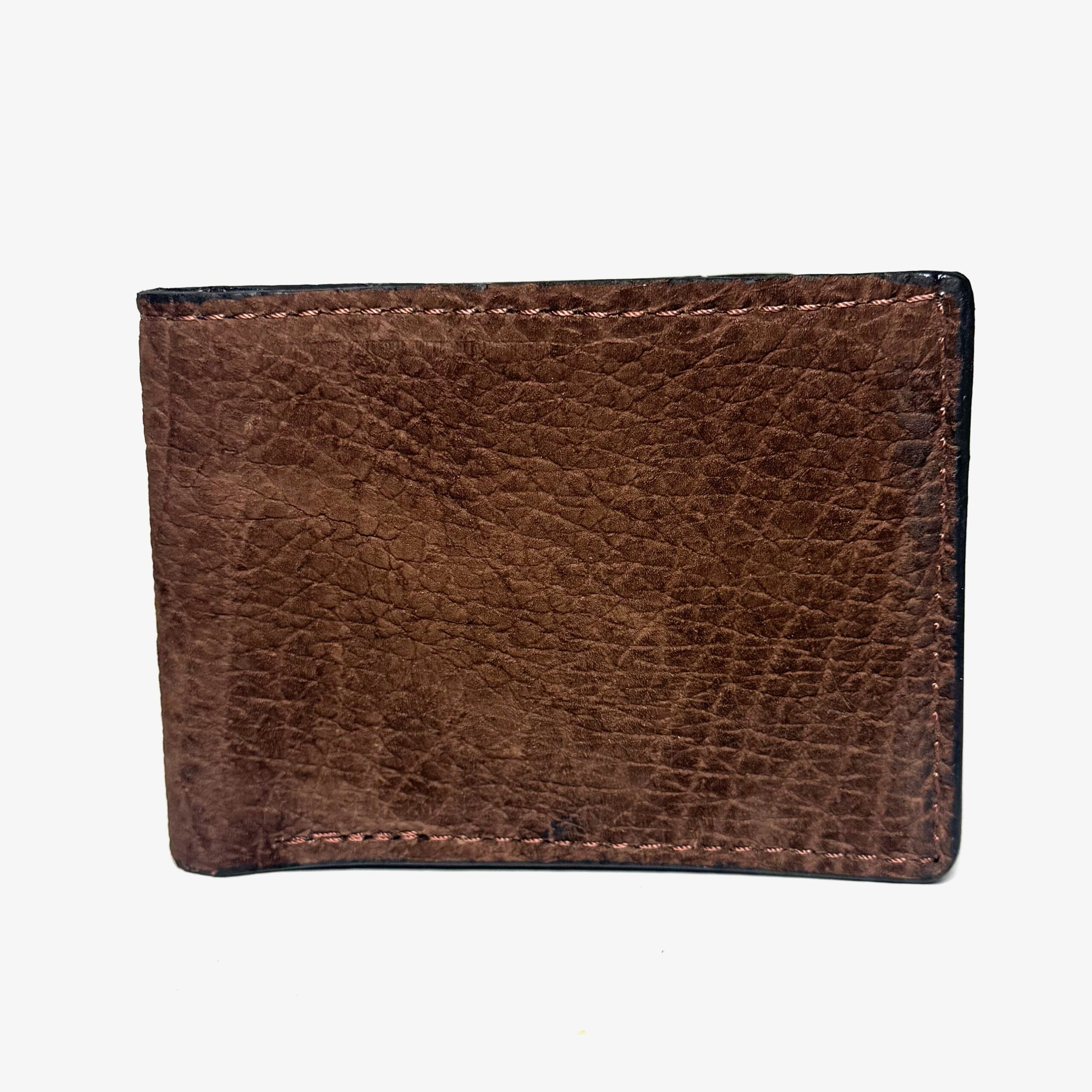 Brown hippo leather bifold wallet showing natural grain and stitching