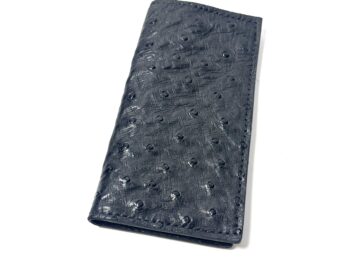 Closed black rodeo wallet handcrafted from real ostrich leather with natural quill texture