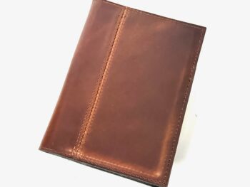 Small brown custom leather portfolio with stitched cover detailing