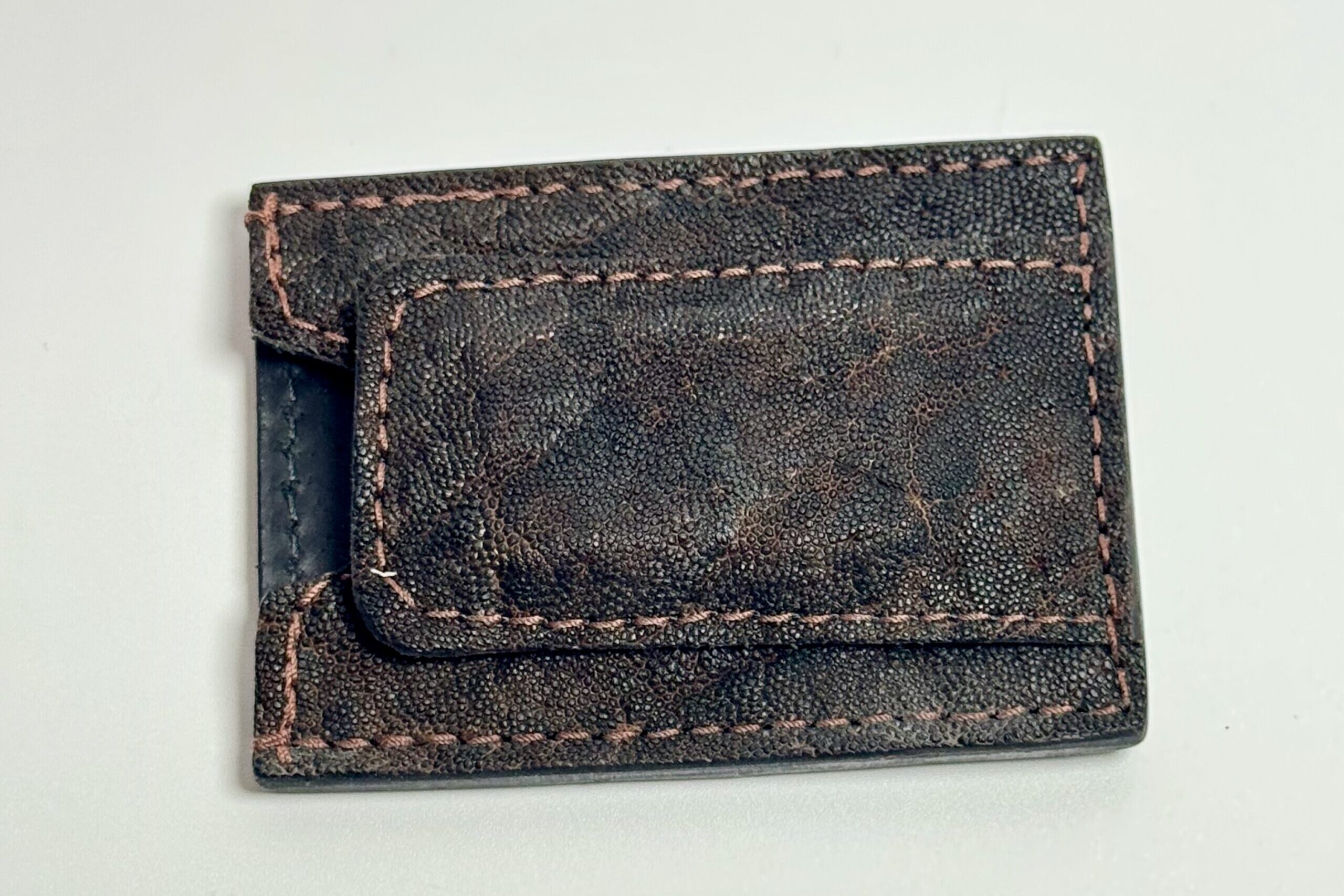 Elephant nicotine leather money clip wallet showing the natural grain and exterior finish