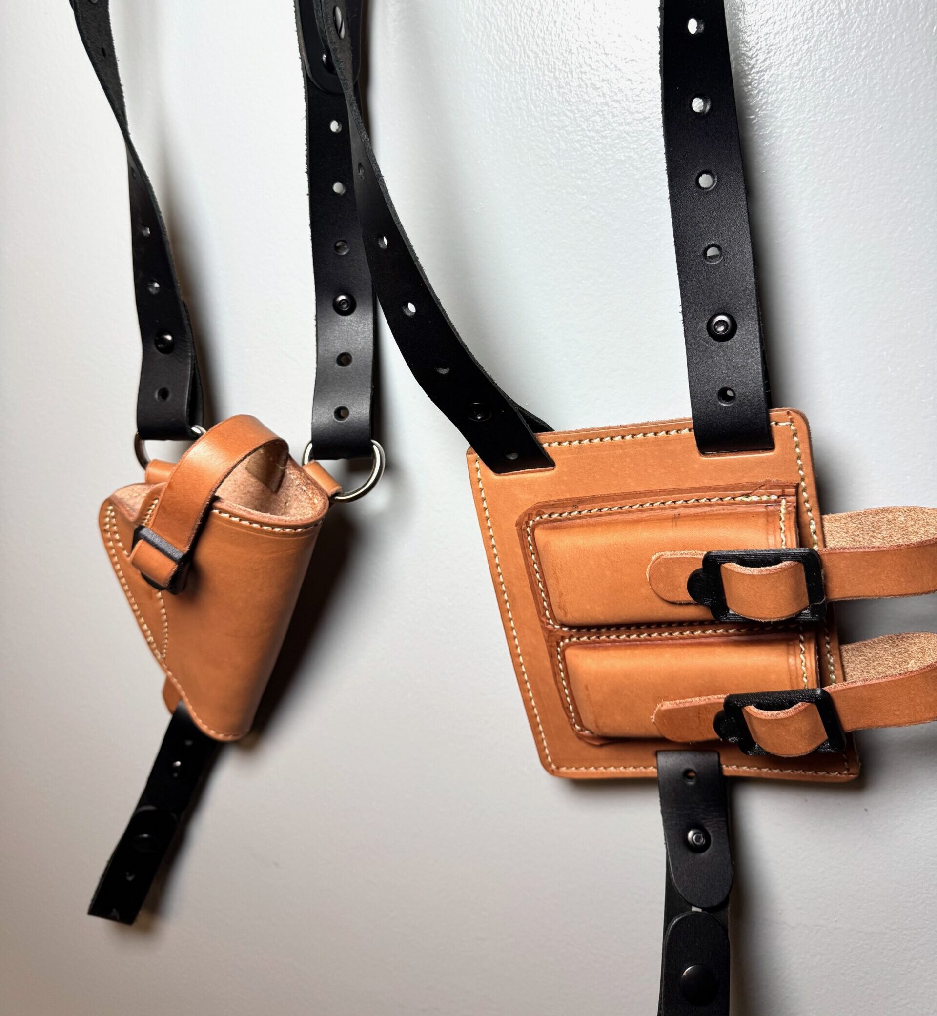 Tan 1911 shoulder holster with matching double magazine carrier and black harness