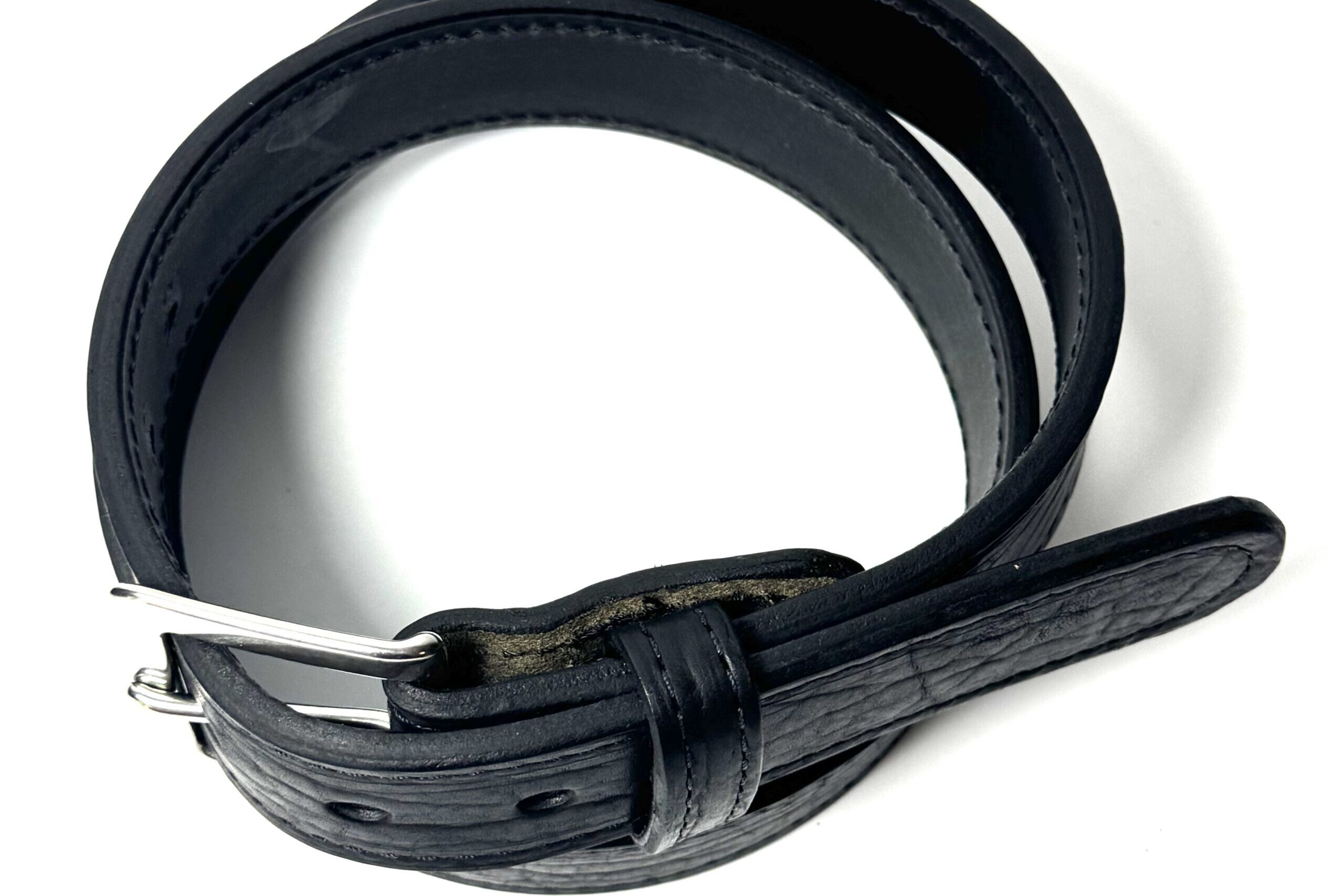 Bison Black Premium Heavy Leather Belt handcrafted from premium black bison leather backed with full grain cowhide and finished with a stainless steel buckle.
