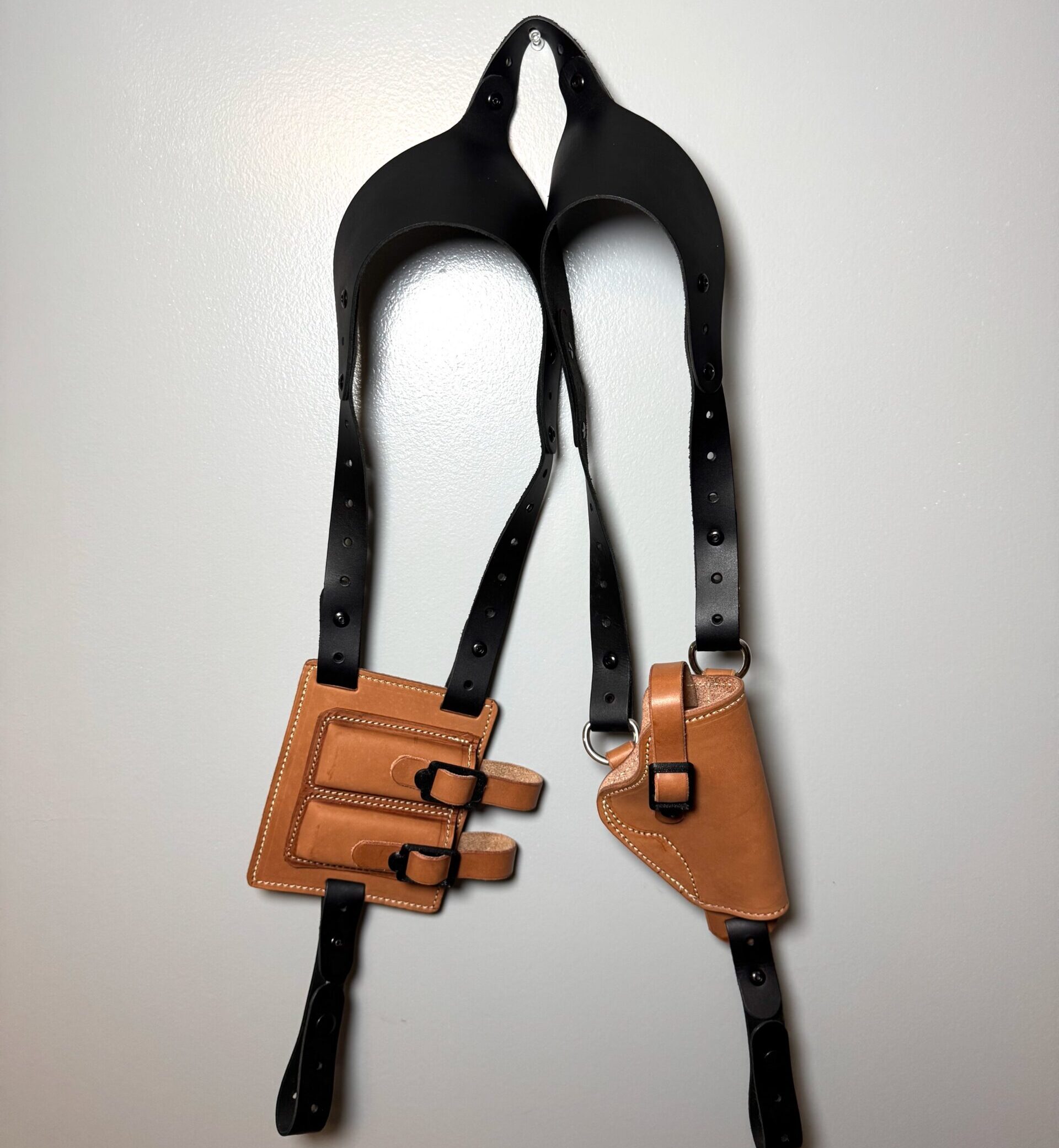 Full black leather shoulder harness with tan 1911 holster and magazine carrier
