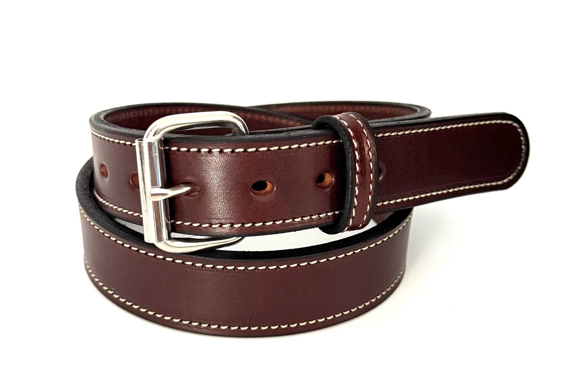 Front view of brown cowhide belt with white stitching and stainless steel roller buckle