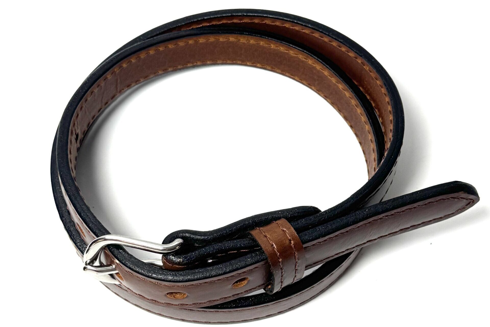 Top view of brown raised center cowhide belt showing stitched construction