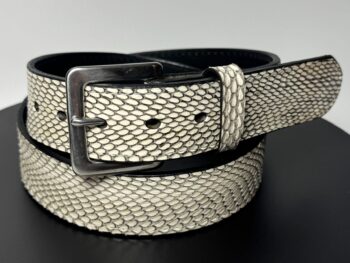 Rolled natural cobra leather belt showing black full-grain leather backing