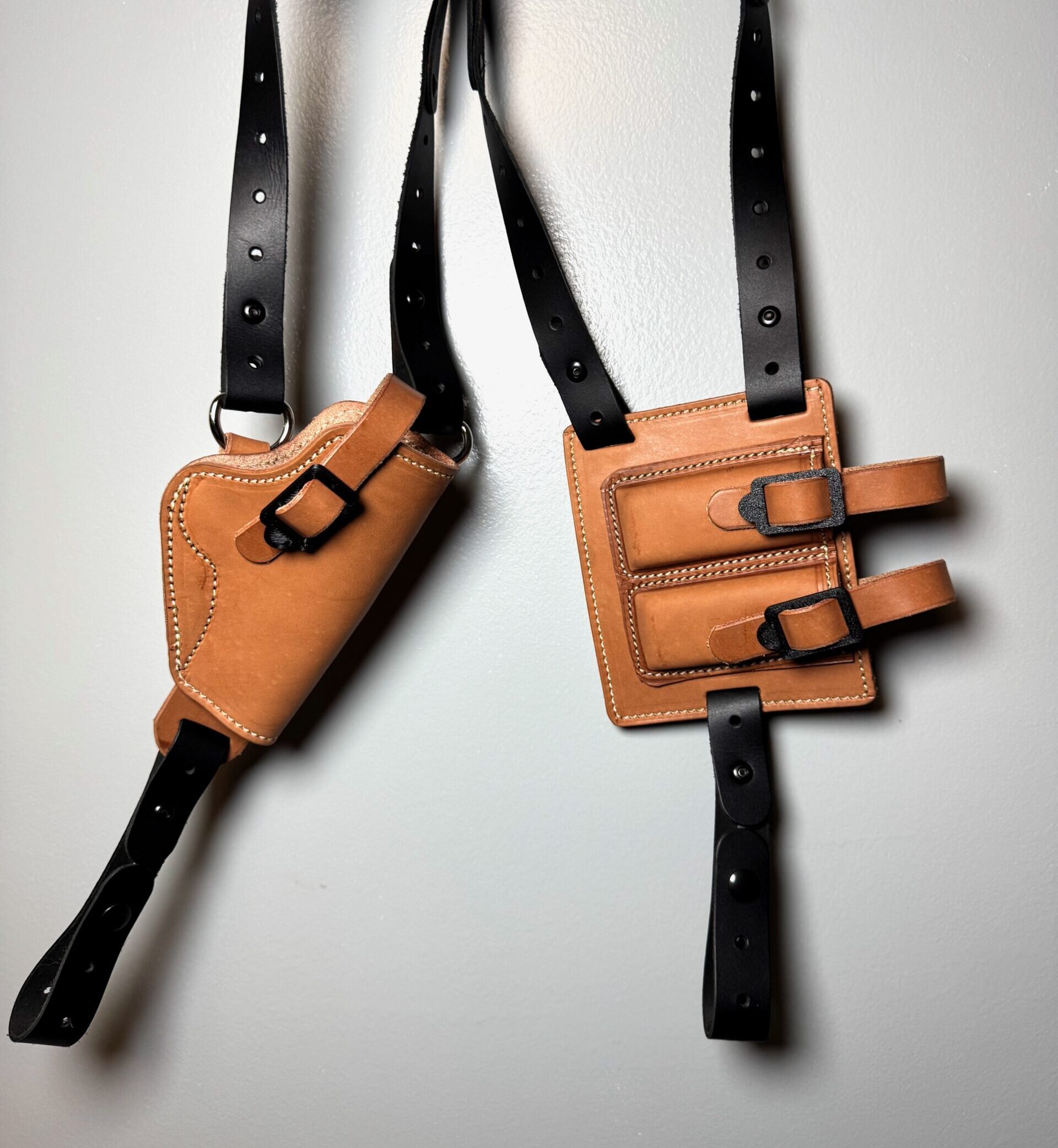 Black and tan 1911 leather shoulder holster system with dual magazine carrier