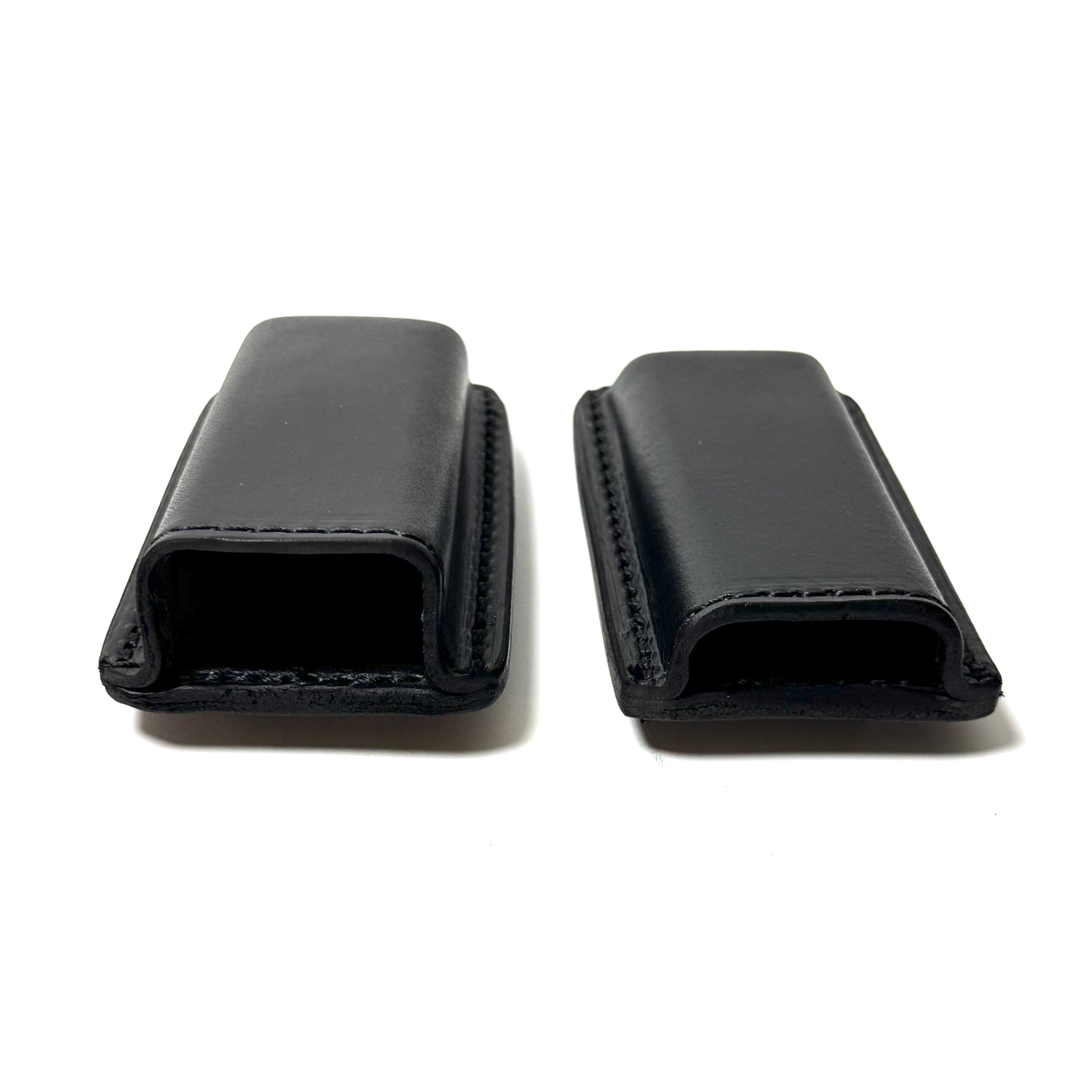 Black cowhide leather magazine carriers in two sizes