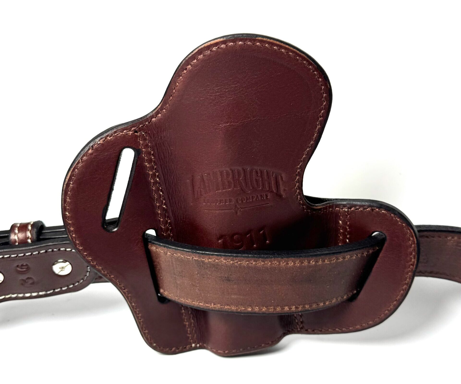 Back of brown 1911 leather holster showing belt loop construction