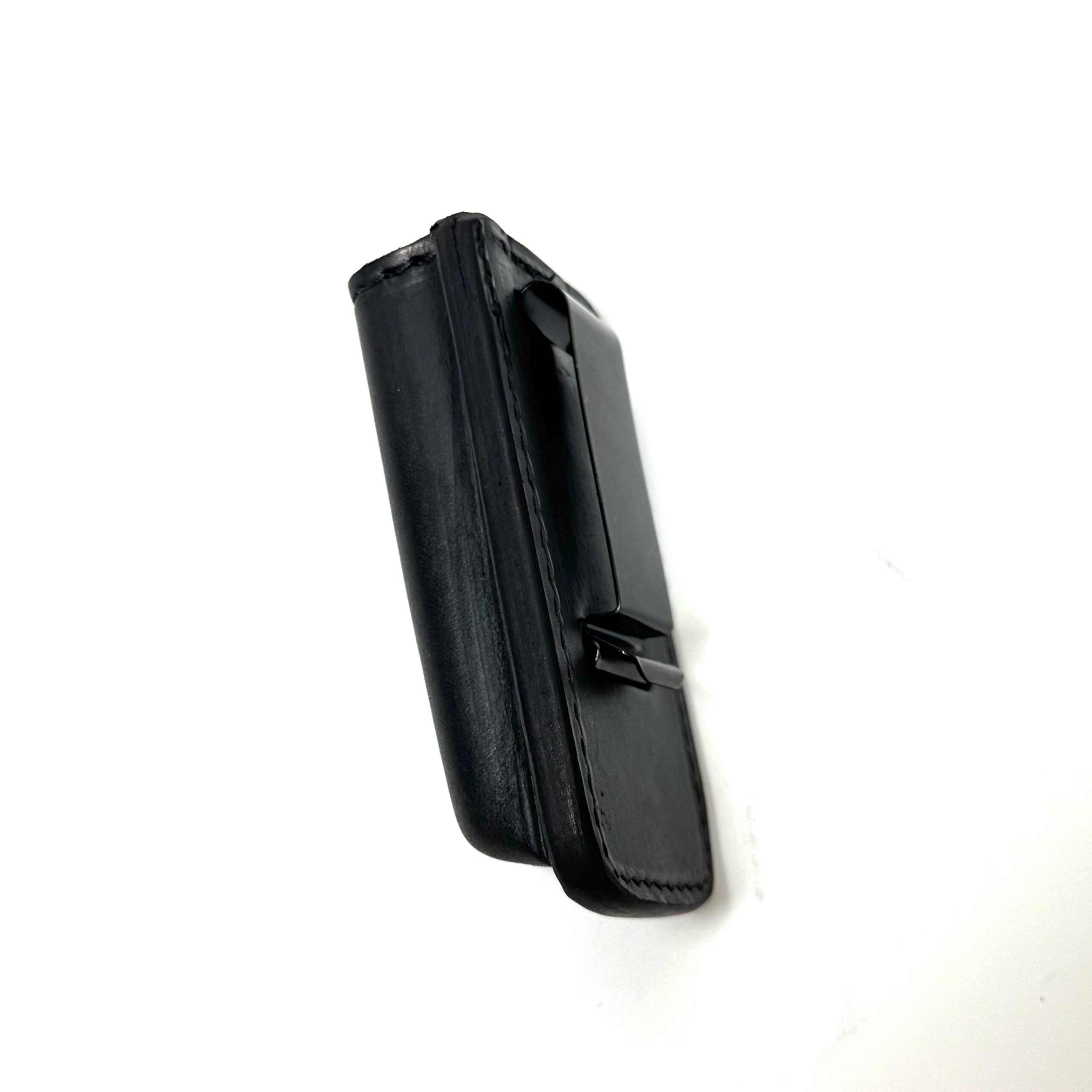 Black leather magazine carrier showing strong rear belt clip
