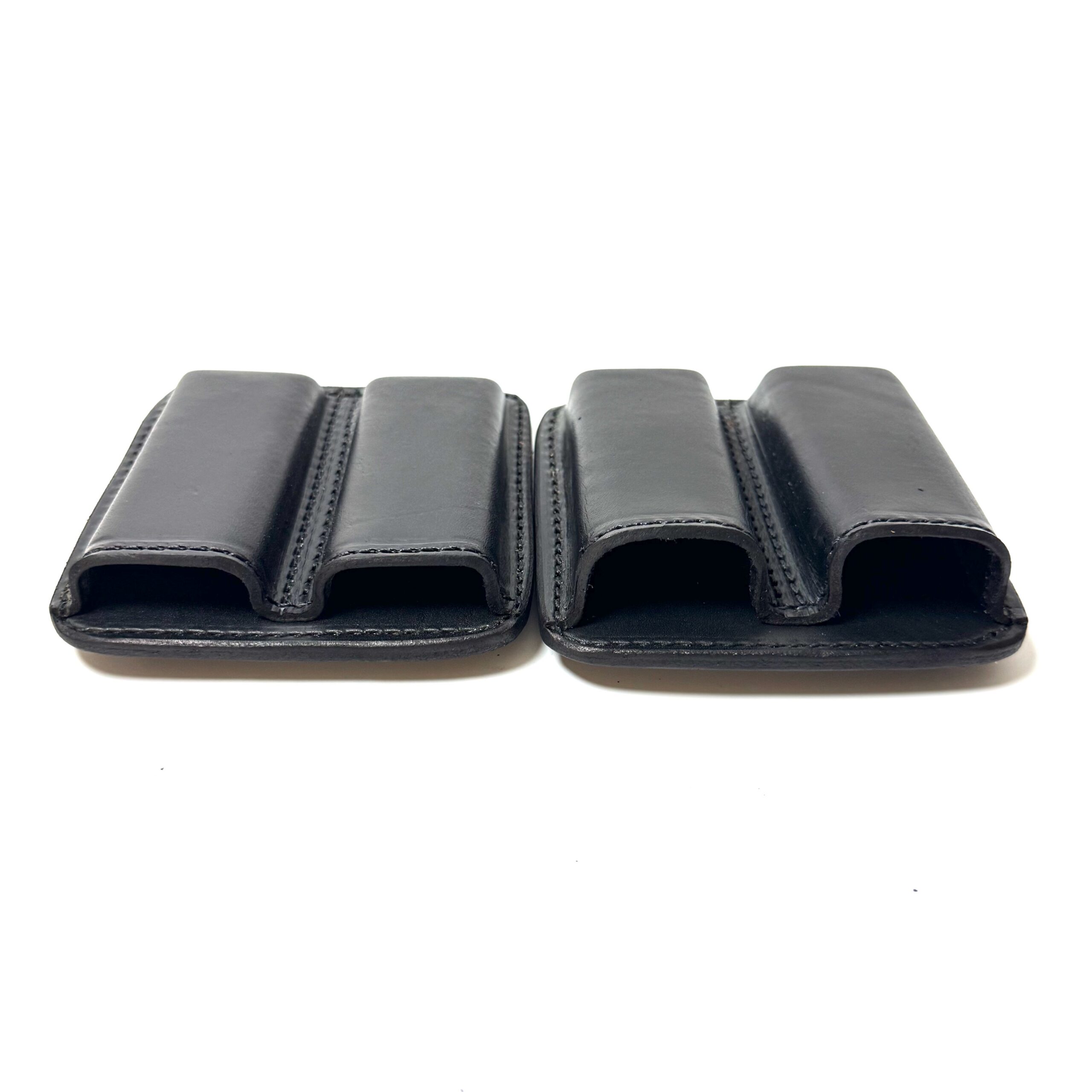 Black dual leather magazine pouch showing two formed compartments